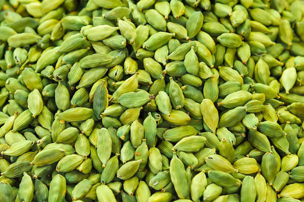 Pods of green cardamom in a pile Cardamom
